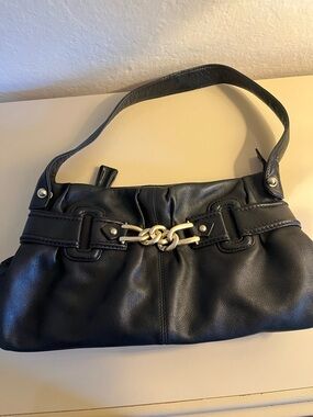 Black Leather Shoulder Bag with Gold Knot Accent